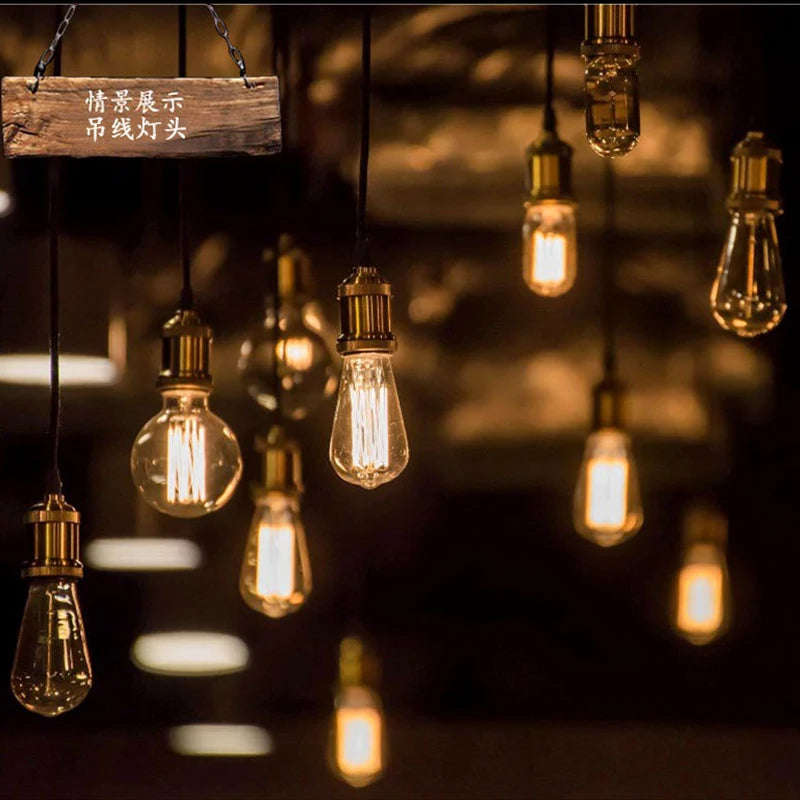 ampoules led transparentes vintage dorées cuivrées noires chaînes câbles filaments visibles rétro