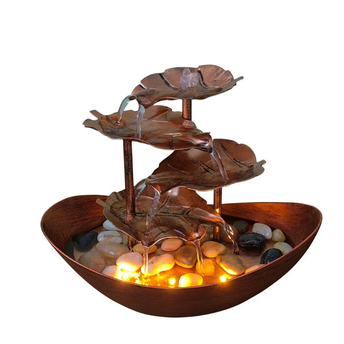 fontaine d'eau moderne feuilles stylisées pierres doré marron gris ambiance led naturelle