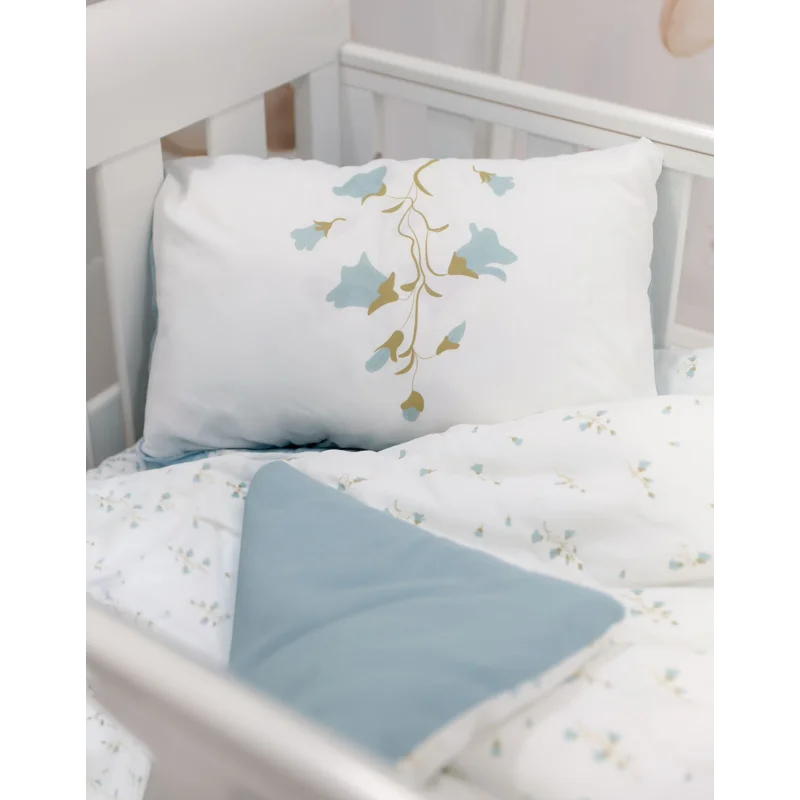 ensemble literie enfant literie bébé blanc rose bleu motifs floraux doux coton