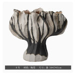 vase moderne porcelaine rose pâle ondulé décoration maison salon arrangement floral