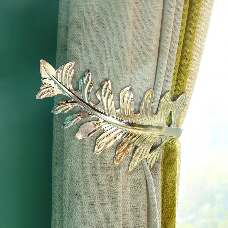pince rideau métal moderne feuille stylisée argent doré cuivre opaque
