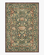 Tapis rose avec canapé beige et coussins