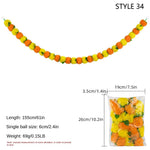 guirlande artificielle jaune rouge vert boules couleur petites feuilles cloches dorées décoration fête mariage