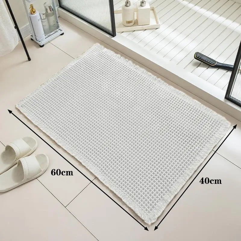 tapis bain beige clair gaufré antidérapant franges moderne dimensions 60x40cm
