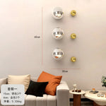 décoration murale moderne sphères miroitantes argentées orange blanches fixations muralesintérieur chambre salon
