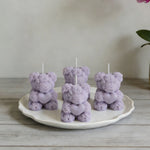 bougies parfumées forme nounours parfum rose couleur violet rouge blanc aromathérapie
