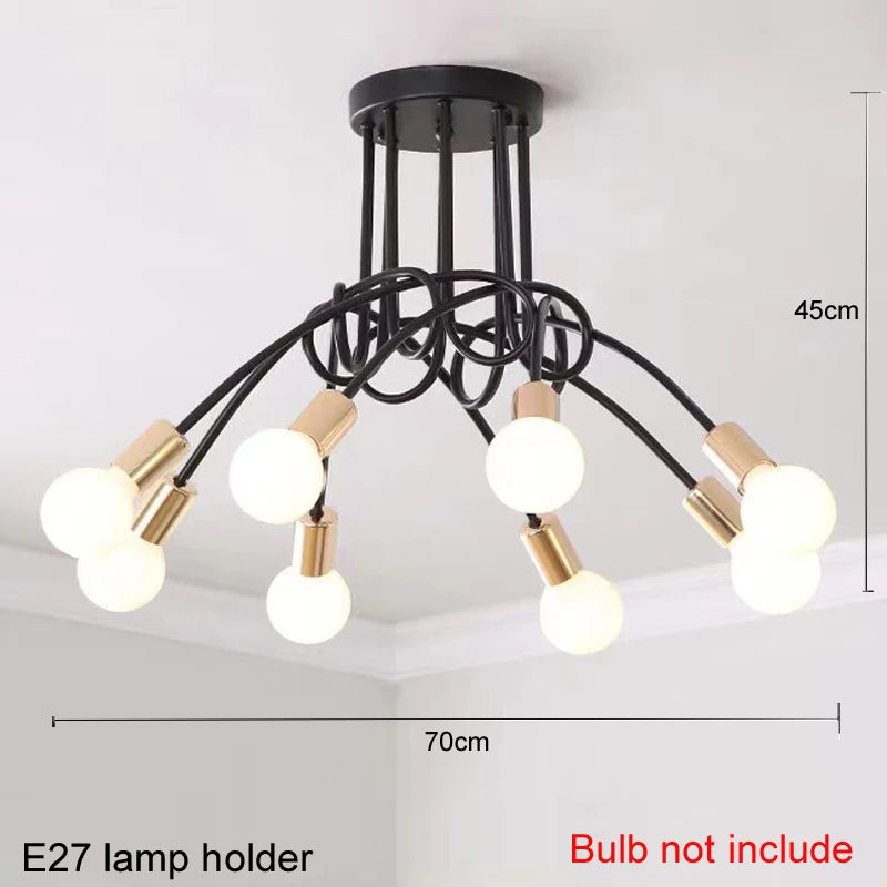 suspension lumineuse moderne noir doré ampoules blanches structure spirale fixation câbles métallique