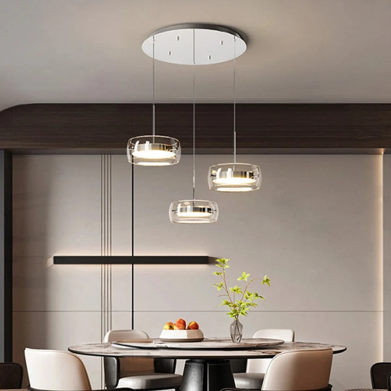 suspension lumineuse moderne trois abat jours argentés abat jours transparents éclairage led salon chambre