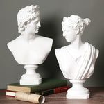 statues antiques blanc buste apollon arthemis sculptures details classiques art grec romain livres papier