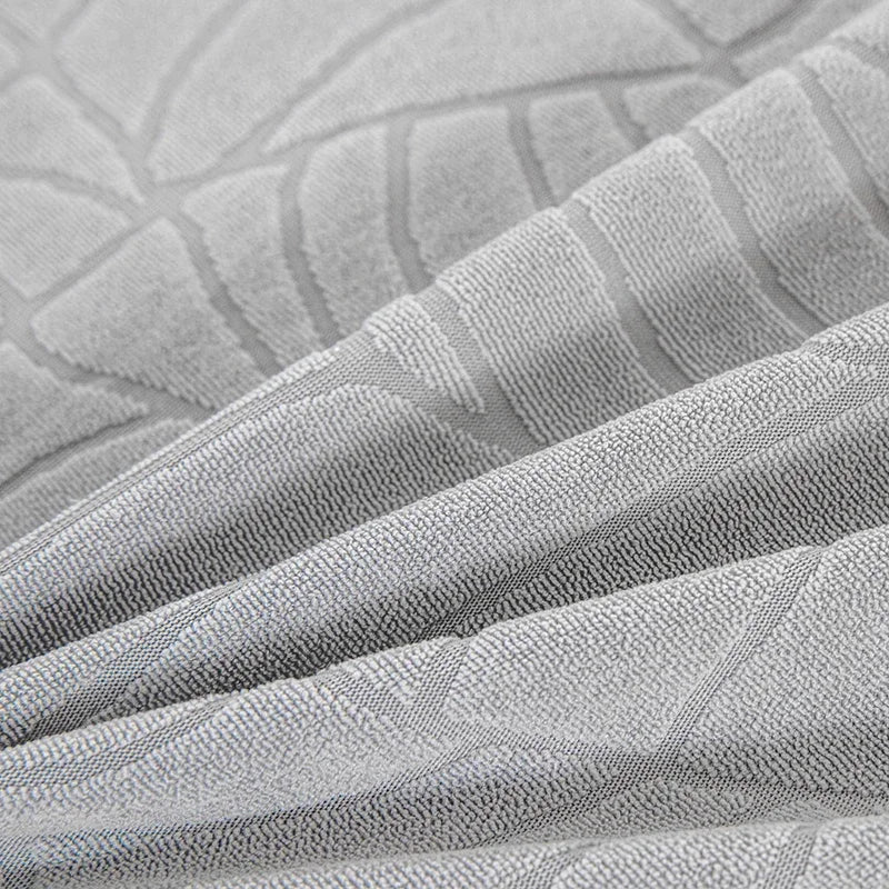 coussins canapé coton jacquard feuilles stylisées moderne gris clair marron foncé beige clair printemps