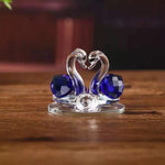 décoration maison sculpture cygne transparent violet bleu réaliste artisanal moderne base circulaire