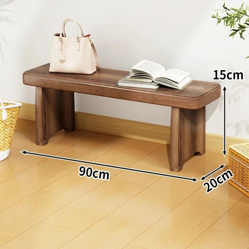 Banc bois marron clair texture naturelle moderne salon tabouret sac main livre ouvert decoration
