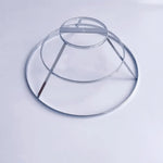 support lampe moderne minimaliste structure circulaire argenté doré barres horizontales verticales opacité fixations invisibles