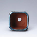 pots fleurs céramique moderne bleu brun texture grained non enduit drainage plante verte