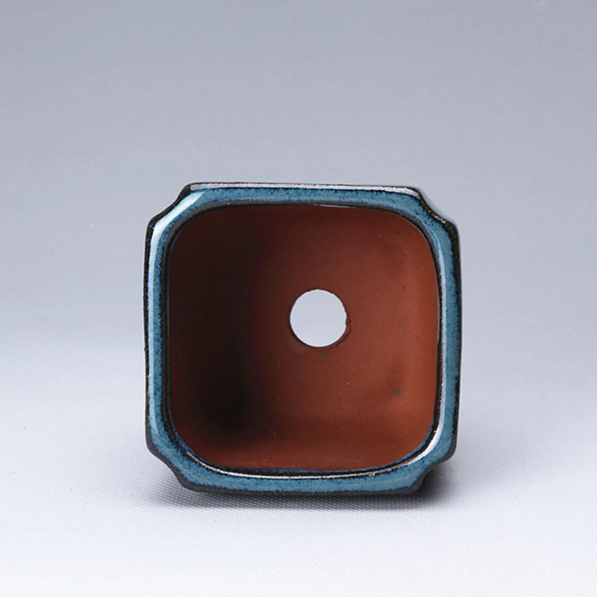 pots fleurs céramique moderne bleu brun texture grained non enduit drainage plante verte