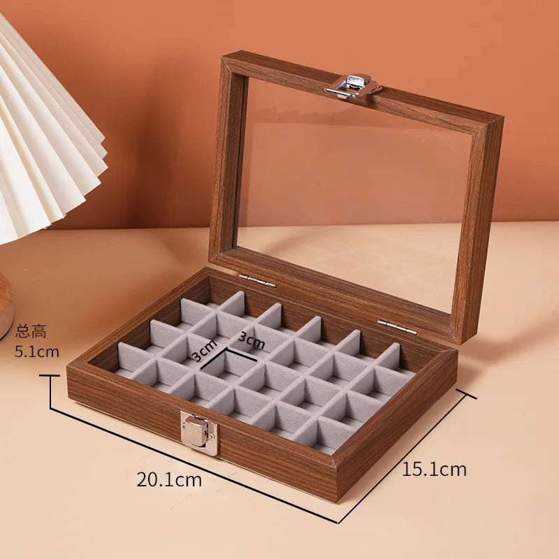 boîte bijoux contemporaine transparente compartiments blancs texture bois poignée métallique minimaliste organisation trousse toilette