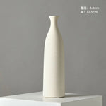 vases céramique blancs rayures horizontales modernes fleurs artificielles