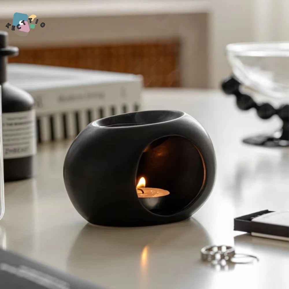 diffuseur huiles essentielles moderne minimaliste couleur noire matériau polyrésine aromathérapieintérieur deco fonctionnel