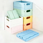 boîtes rangement pliables moderne bleu clair vert pastel blanc jaune rose orange pastilles perforations