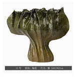 vase moderne porcelaine rose pâle ondulé décoration maison salon arrangement floral
