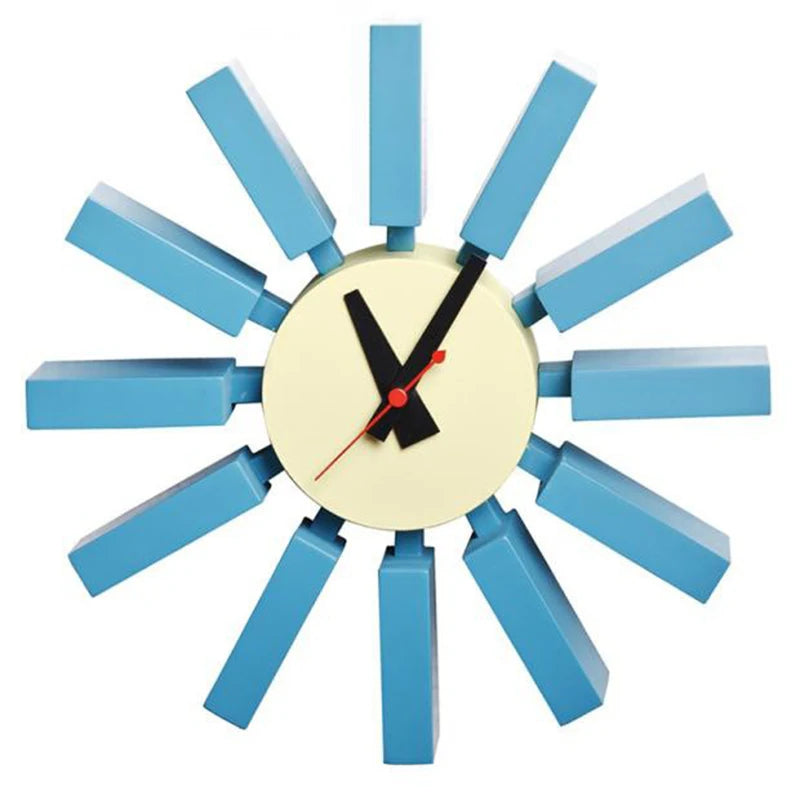 Horloge murale mid century bleu orange noir aiguilles rouge cadran blanc atomique époque