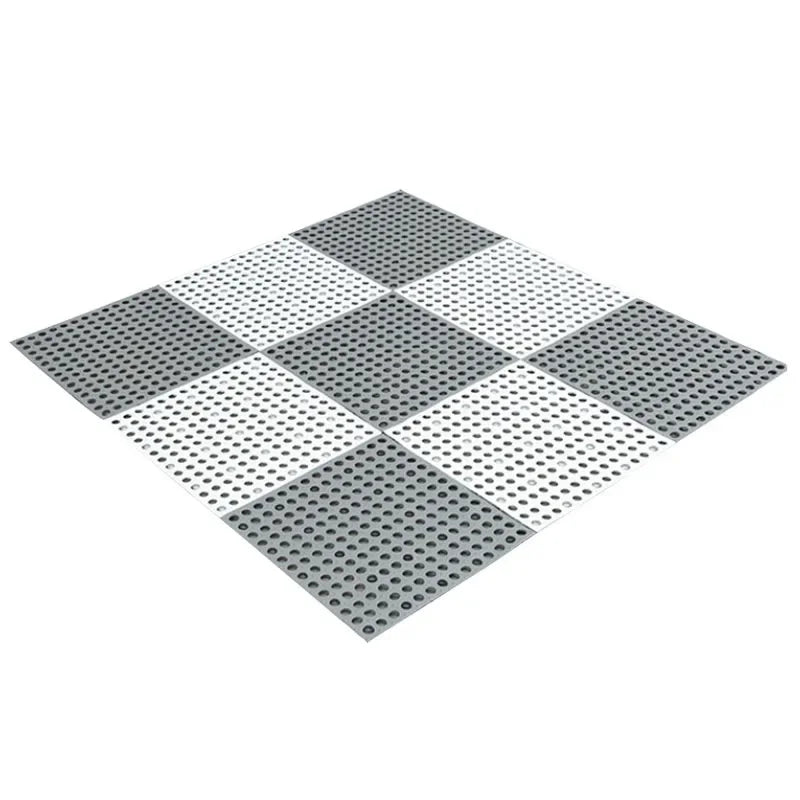 tapis salle bain modulable perforations texturées moderne jaune vert gris fixations noires éléments