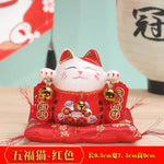 statue chat porte bonheur traditionnel chinois blanc jaune bleu symboles papillons caractères chinois