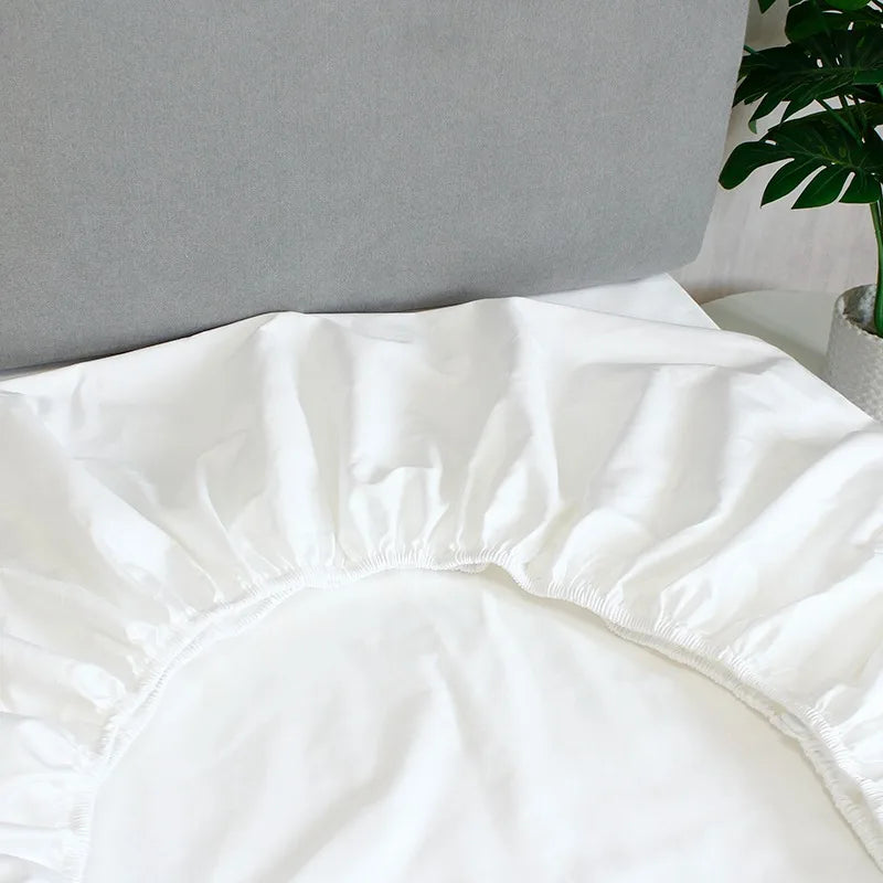 draps lit blancs satinés king size boutonnés complet moderne ecofriendly