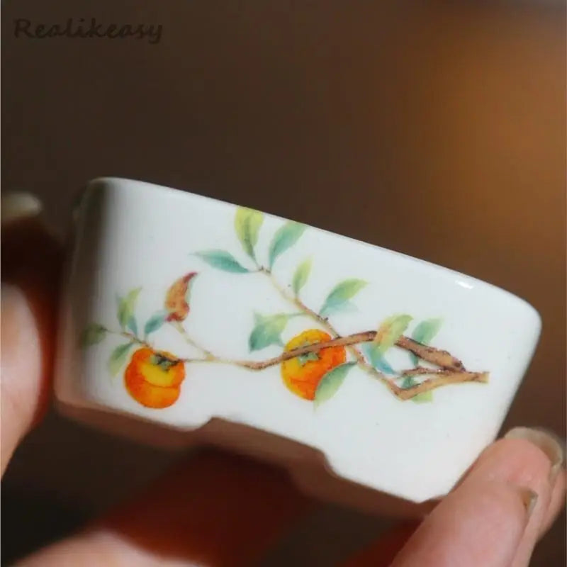 bol traditionnel décoré fruits pommes paysage motifs ondulés blanc orange bleu