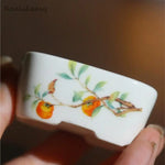bol traditionnel décoré fruits pommes paysage motifs ondulés blanc orange bleu