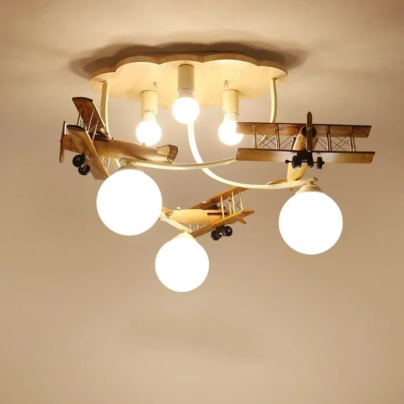 lampe bois naturel avions sphères translucides vintage moderne chambre enfants