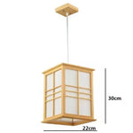 lampe suspendue bois japonaise fenêtres traditionnelles lumière douce salon chambre zen