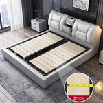 lit double moderne gris clair simili cuir tiroirs latéraux table chevet