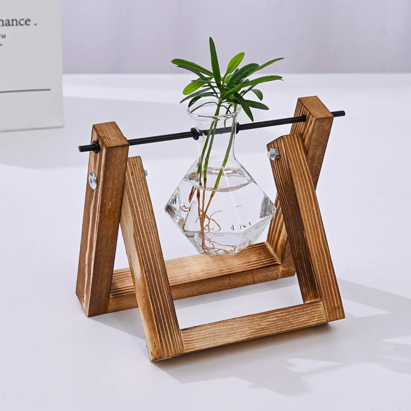 Support plantes moderne vase verre transparent bois marron clair minimaliste fixations vis vases