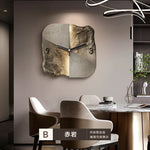 horloge murale moderne abstraite pierre trois dimensions gris beige marron fixée salon