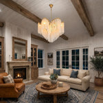 chandelier moderne or opalescent lumière blanche chaîne suspension élégante chambre salon