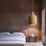 suspension lumineuse pendentif résine beige clair texture granuleuse moderne salon chambre principal