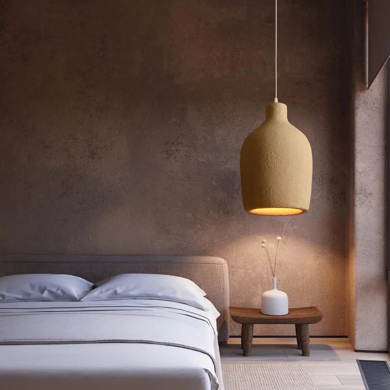 suspension lumineuse pendentif résine beige clair texture granuleuse moderne salon chambre principal