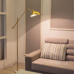 lampadaire sol moderne noir base marbre ajustable métal doré salon intérieur luxe