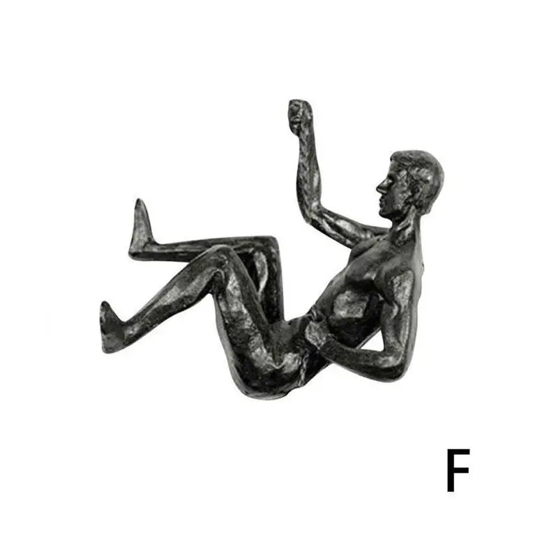 statues métal noir sculptures humaines diverses postures art moderne decoration murale