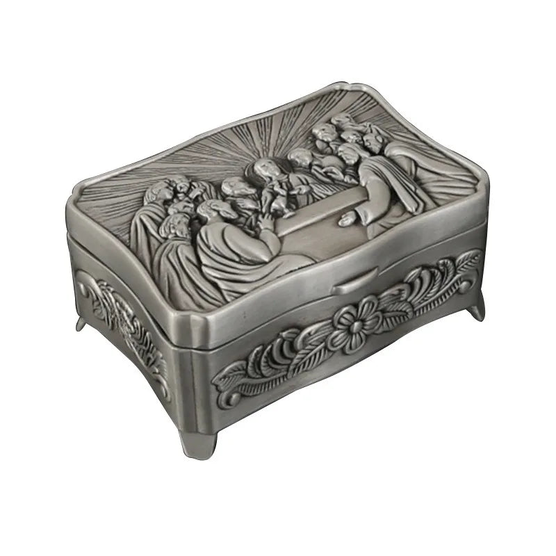 boîte bijoux argentée relief religieux intérieur noir classique orné poignée métallique