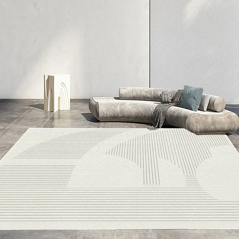 L'image montre un agencement harmonieux de mobilier et d'éléments décoratifs dans un espace minimaliste et épuré, créant une atmosphère sereine et apaisante.