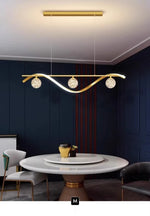 suspension lumineuse moderne or noir blanc sphères translucides élégant led chambre salon
