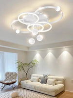 lustre moderne suspension contemporain argenté doré blanc noir globes translucides anneaux lumineux strass decoration