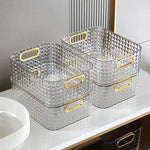 boîtes rangement transparentes paniers minimalistes poignées métalliques dorées moderne texture géométrique