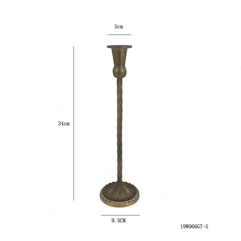 bougeoirs classiques bronze finement sculptés décoration maison vintage élégants fixations