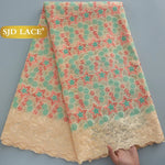 tissu dentelle fleurs vert bleu violet rose beige brodé occasionnelle traditionnelle