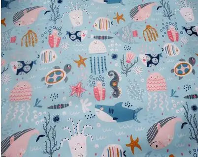 tissu coton imprimé thème marin poissons coquillages enfants blanc rose bleuclair vert