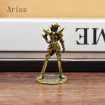 statue zodiaque cuivre dorée détails sculptés armure ailes base plate occasion anniversaire noël