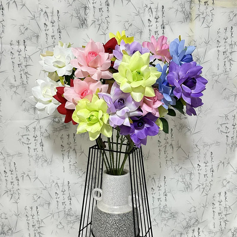 décoration intérieure bouquet fleurs artificielles soie moderne vase livres minimaliste rouge jaune